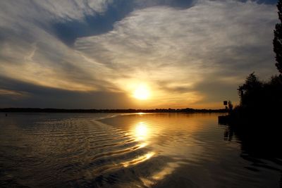 Scenic view of sunset over river