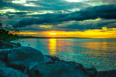 Scenic view of sea against sky during sunset