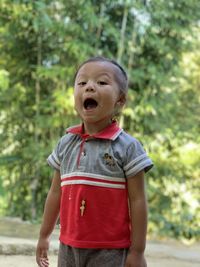 Cute girl standing outdoors