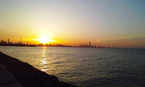 Scenic view of sea at sunset