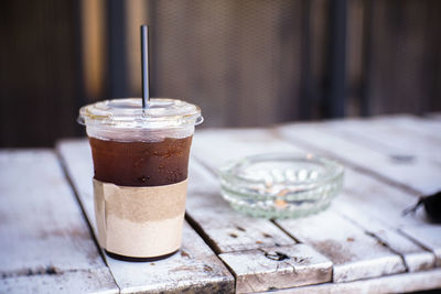 Close-up of coffee in glass on table