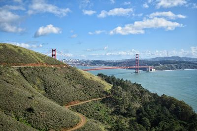 Bridge over sea against sky