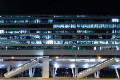 Low angle view of illuminated building at night