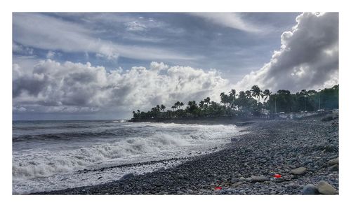 Panoramic view of beach against sky