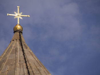 Low angle view of illuminated building against sky