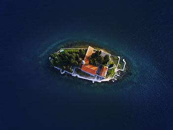 High angle view of ship sailing in sea