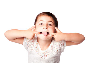 Close-up portrait of a girl over white background