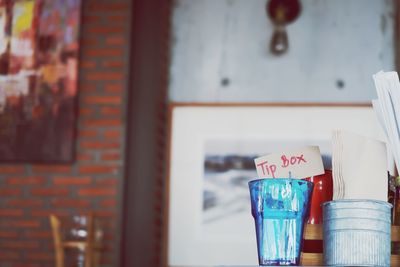 Close-up of glasses on table 