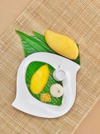 High angle view of fruits in plate on table