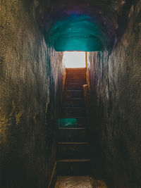 Low angle view of empty tunnel