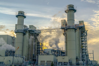 View of smoke stack against sky