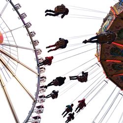 Low angle view of ferris wheel against sky