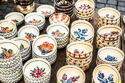 High angle view of various potteries for sale at market stall