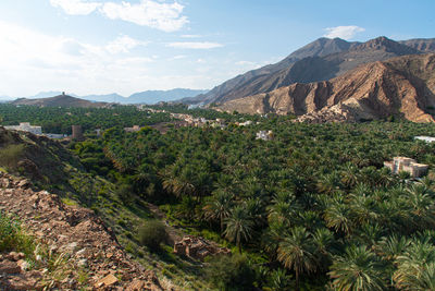 Scenic view of landscape and mountains against sky