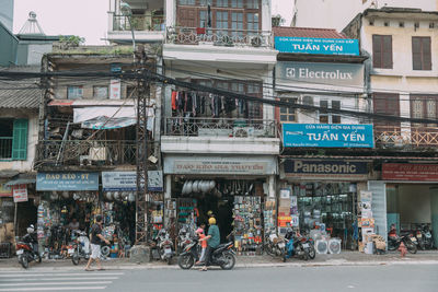 People on road in city