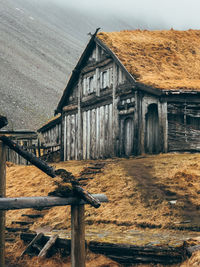 House on field against sky