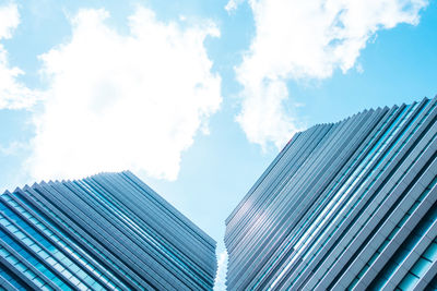 Low angle view of modern buildings against sky