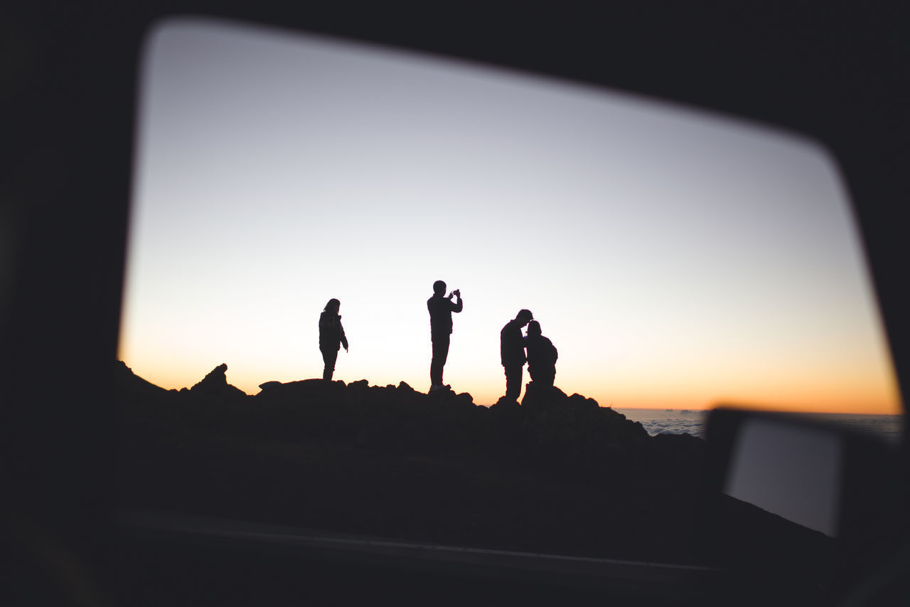 SILHOUETTE PEOPLE AGAINST SKY DURING SUNSET