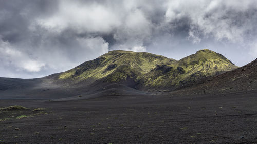 Panoramic view of volcanic mountain against sky