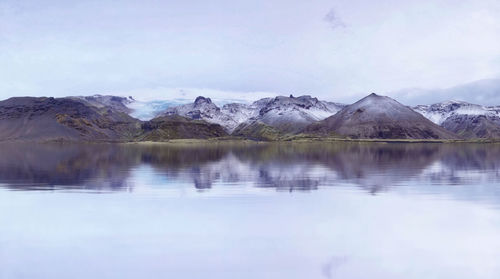 Beautiful scenery eyjafjallajokull, iceland with smooth reflection and glacier on the mountains.