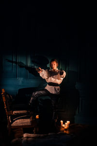 Man sitting on stage