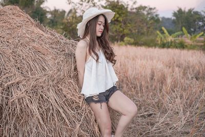 Young woman wearing hat