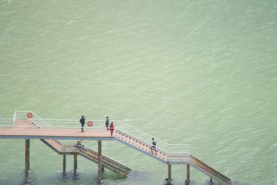 High angle view of tourists on pier