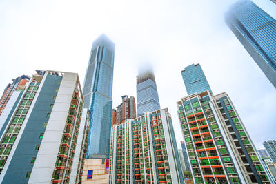 Low angle view of modern buildings against sky