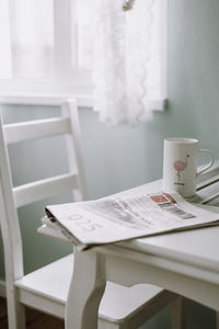 Coffee cup on table at home