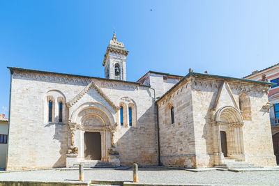 Low angle view of church against clear blue sky