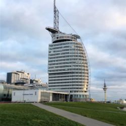 View of buildings against cloudy sky