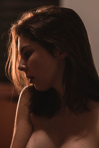 Portrait of young woman looking away