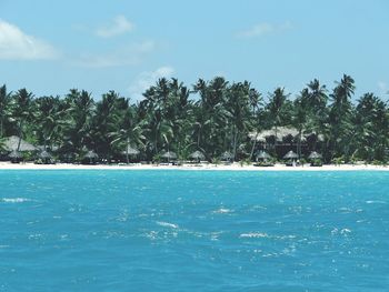 Scenic view of sea against blue sky