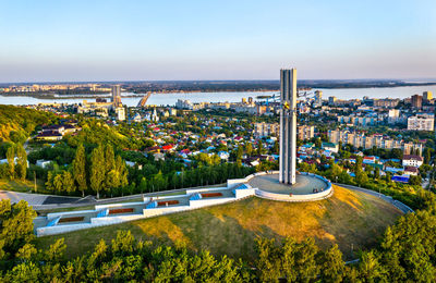 High angle view of trees and buildings against sky