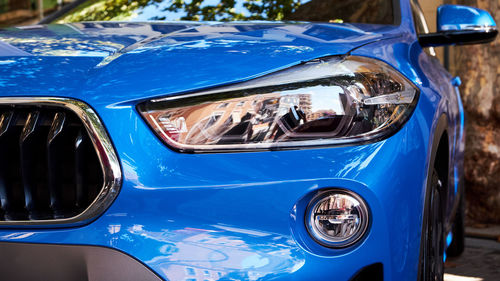 Close-up of blue car