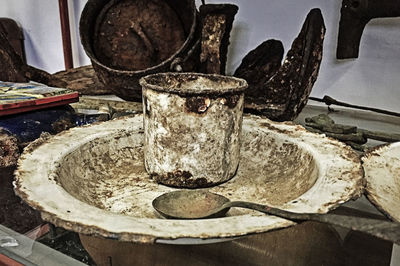 High angle view of paintbrushes in container on table