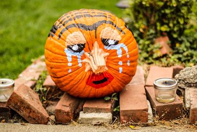 Close-up of pumpkin on field