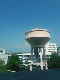 Low angle view of water tower against clear sky