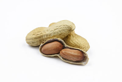 Close-up of bread against white background