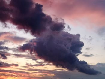 Low angle view of dramatic sky during sunset