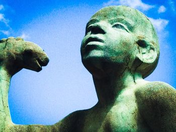 Close-up of statue against sky