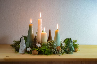 Close-up of christmas decorations on table at home
