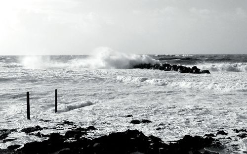 Waves splashing on rocks