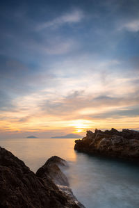 Scenic view of sea against sky during sunset