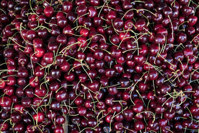 Full frame shot of cherries for sale at market