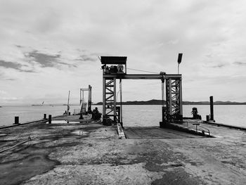 Pier over sea against sky