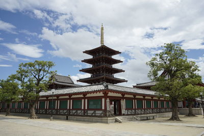 View of pagoda against cloudy sky