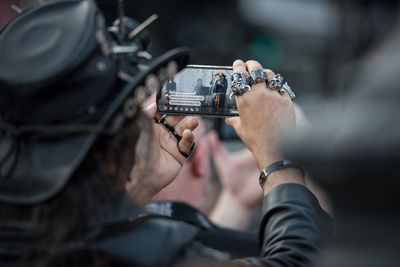 Midsection of man photographing