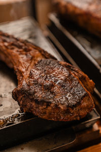 Close-up of meat on barbecue grill