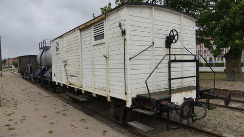 Train on railroad track against sky